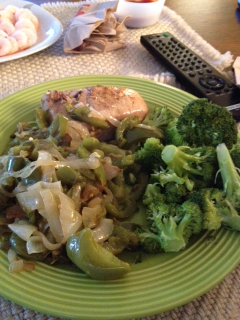 Marinated ahi tuna with peppers and onions and broccoli.